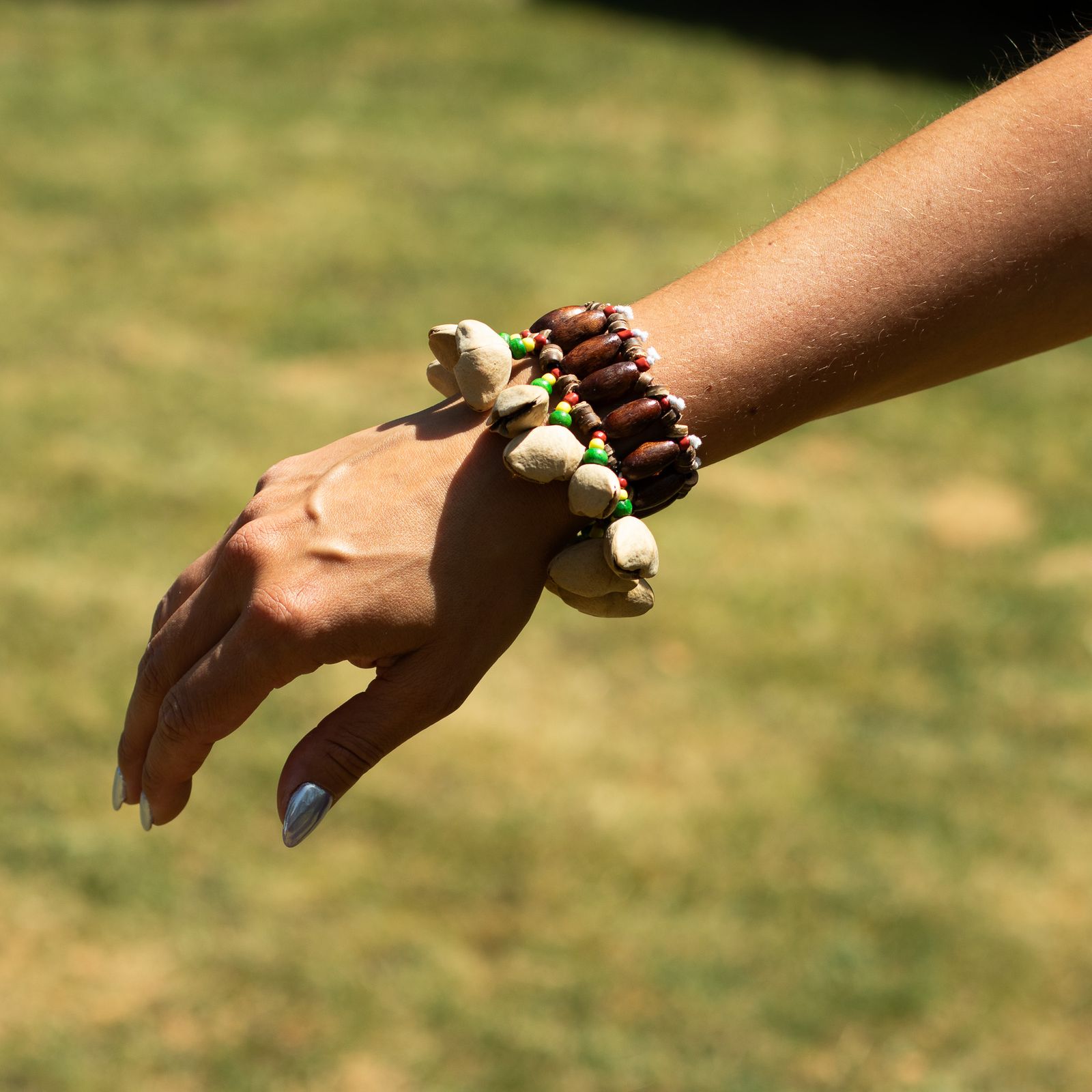 Kenari Shell Hand Shaker - Pulsera Sonajero (15 piezas) - Imagen 3